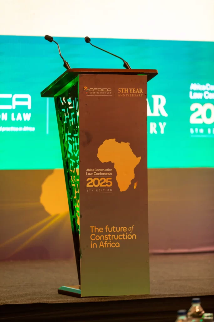 a podium with microphones on a stage