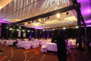 Conference hall with attendees and lighting