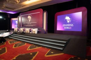 Conference stage with branding backdrop