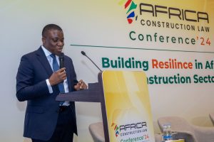 Man speaking at construction law conference