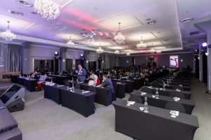 Empty conference hall with tables
