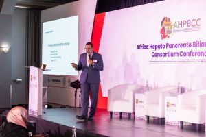 Conference speaker presenting on stage