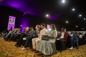 Audience seated in a conference setting